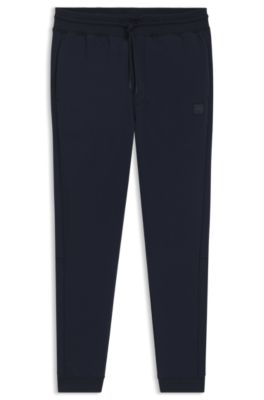 Hugo Boss Cotton-terry Tracksuit Bottoms With Logo Patch In Dark Blue