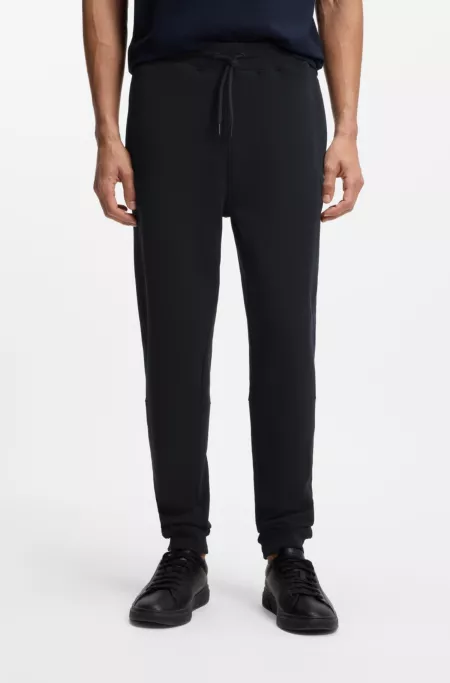 Logo-patch tracksuit bottoms in cotton terry