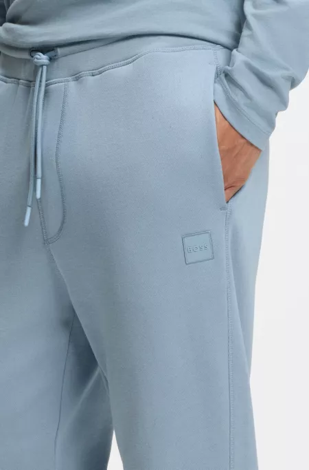 Logo-patch tracksuit bottoms in cotton terry