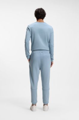 Pantalones de ch&aacute;ndal en felpa de algod&oacute;n con aplique de logo, Celeste