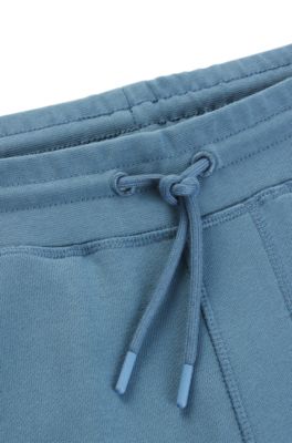 Pantalones de ch&aacute;ndal en felpa de algod&oacute;n con parche de logo, Celeste