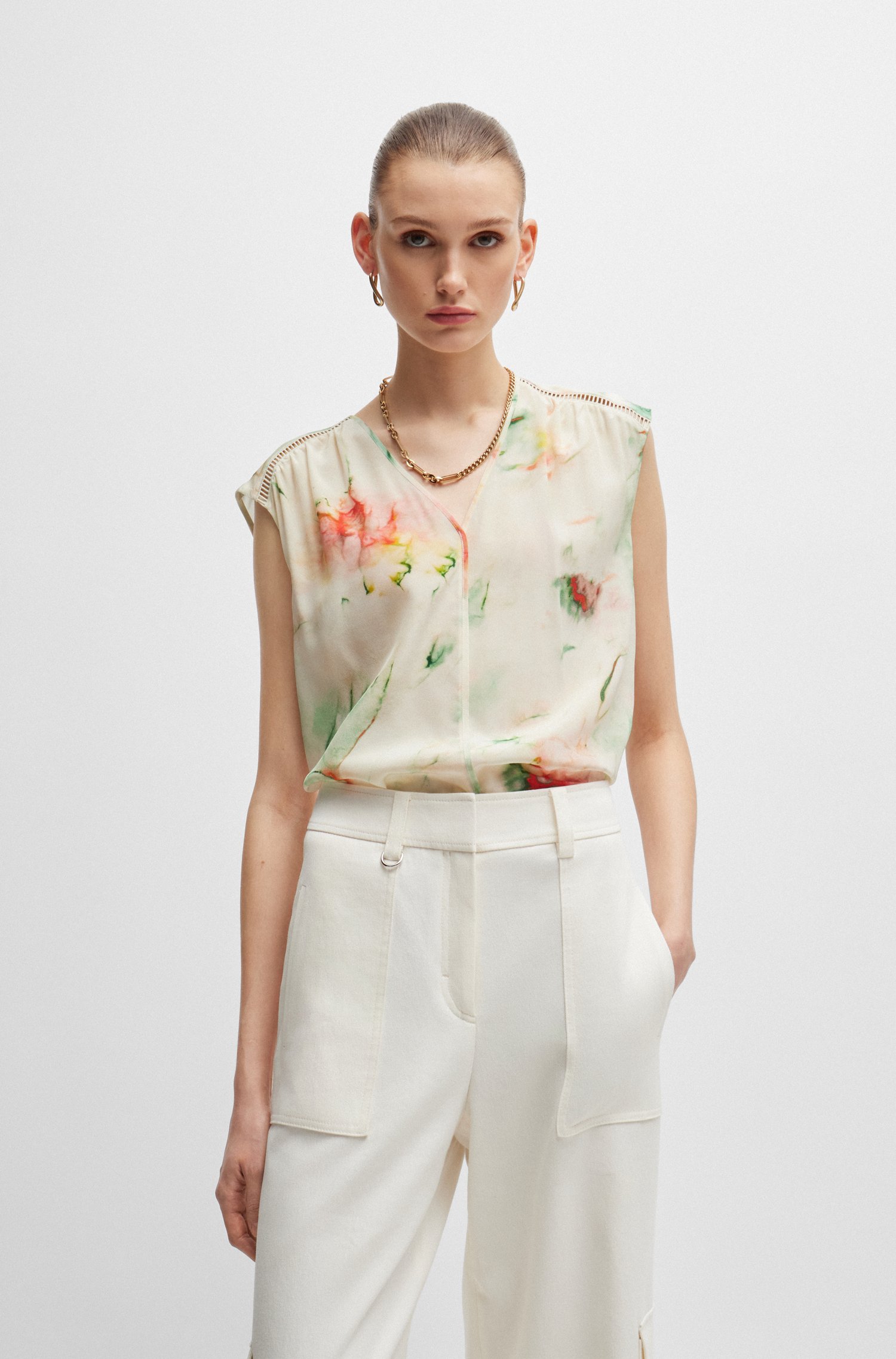 Silk blouse with ladder lace and seasonal print