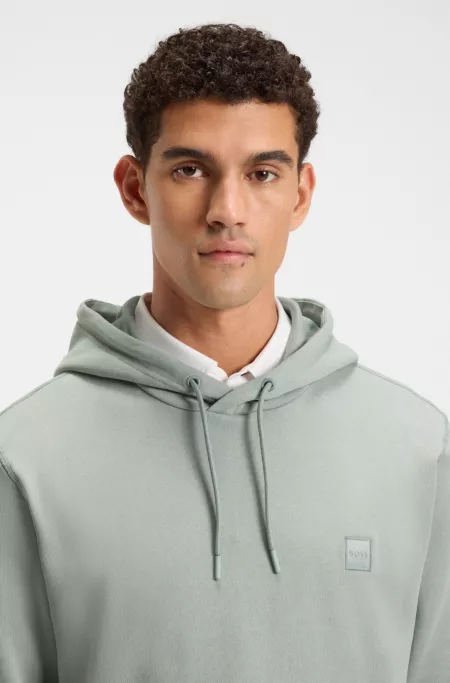 Logo-patch hoodie in cotton terry