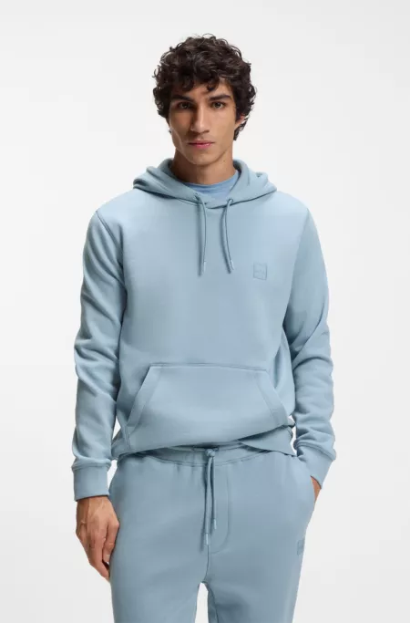 Logo-patch hoodie in cotton terry