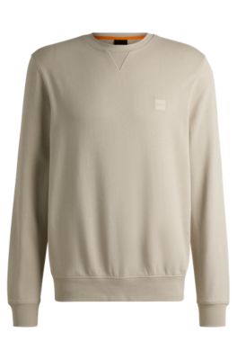 Shop Hugo Boss Cotton-terry Relaxed-fit Sweatshirt With Logo Patch In Light Beige