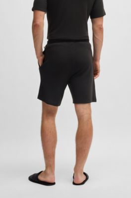 Shorts de pijama en punto el&aacute;stico con logo bordado, Negro