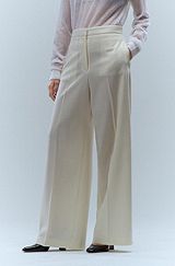 Wide-leg oversize-fit trousers in stretch wool, White