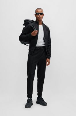 Tracksuit bottoms with pixelated details, Black