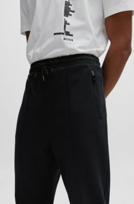 Tracksuit bottoms with pixelated details, Black