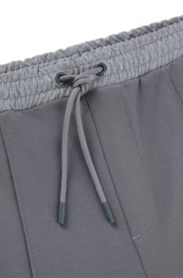 Tracksuit bottoms with pixelated details, Grey
