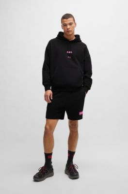 Cotton-terry oversize-fit hoodie with seasonal logos, Black