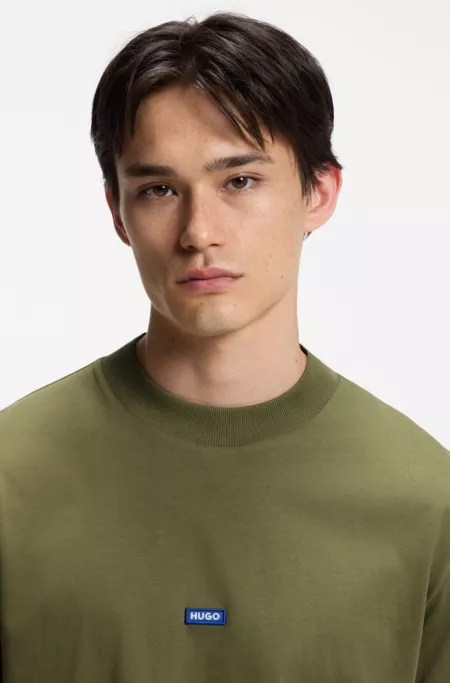 Cotton T-shirt with ribbed neckline and logo badge