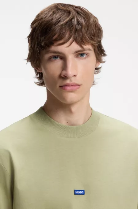 Cotton T-shirt with ribbed neckline and logo badge