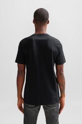 Camiseta regular fit de punto de algod&oacute;n con ilustraci&oacute;n de temporada, Negro