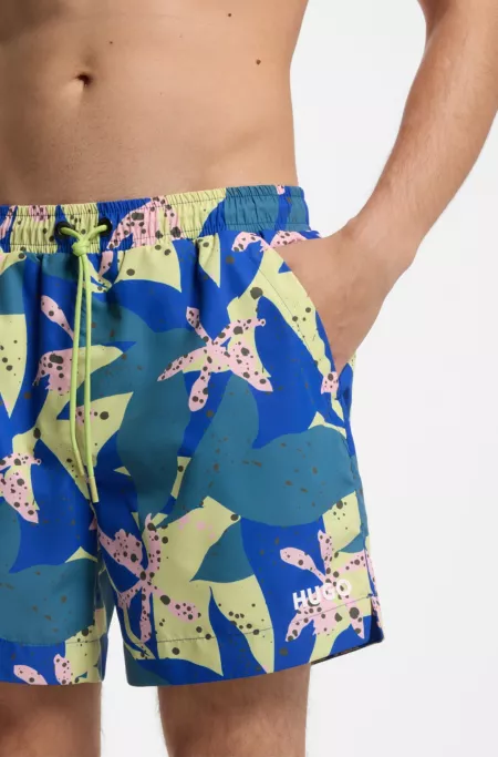 Quick-dry swim shorts with all-over print