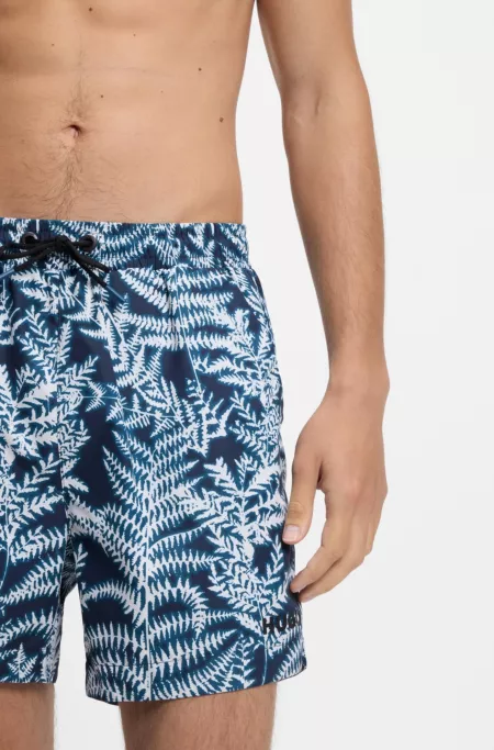 Quick-dry swim shorts with all-over print