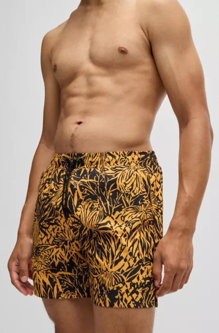Quick-dry swim shorts with all-over print
