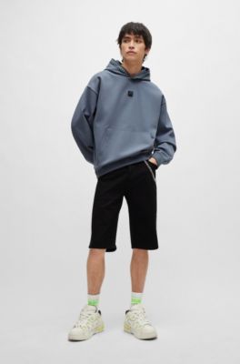 Sudadera con capucha relaxed fit en algod&oacute;n el&aacute;stico con detalle de cadena, Celeste