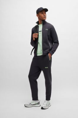 Pantalones de ch&aacute;ndal de algod&oacute;n con logo moldeado en relieve, Gris oscuro