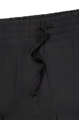 Structured-cotton shorts with red logo label, Black