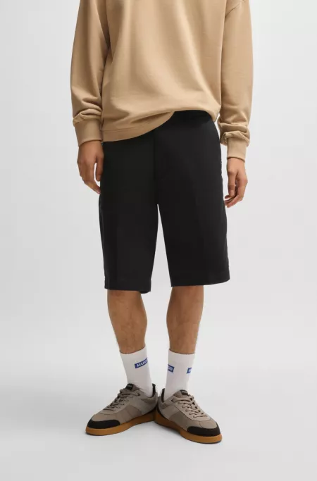 Regular-fit regular-rise shorts in cotton twill