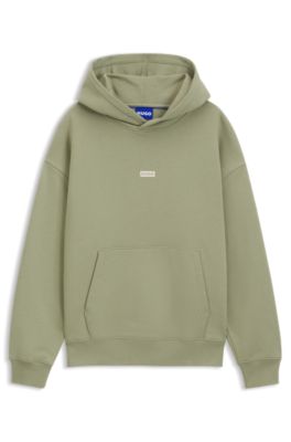 Sudadera holgada con capucha en felpa de algod&oacute;n con detalles de logo, Desbordamiento de color beige