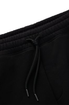 Shorts loose fit en felpa de algod&oacute;n con logo estampado, Negro