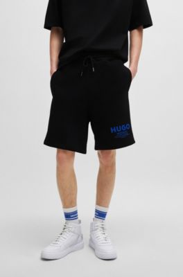 Shorts loose fit en felpa de algod&oacute;n con logo estampado, Negro