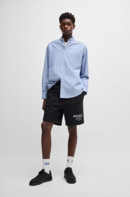 Loose-fit shorts in cotton terry with logo print, Black