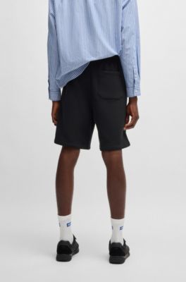 Loose-fit shorts in cotton terry with logo print, Black
