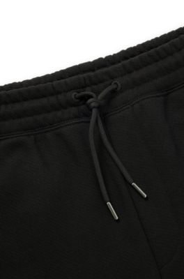 Loose-fit shorts in cotton terry with logo print, Black