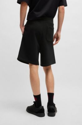 Loose-fit shorts in cotton terry with logo print, Black