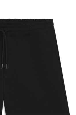 Loose-fit shorts in cotton terry with logo print, Black