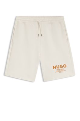 Loose-fit shorts in cotton terry with logo print, White