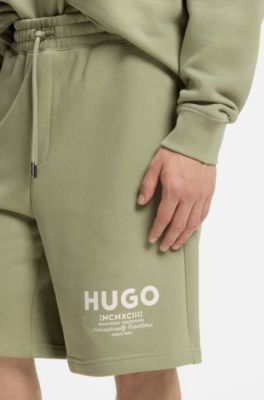 Shorts loose fit en felpa de algod&oacute;n con logo estampado, Desbordamiento de color beige