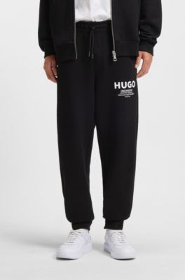 Pantalones de ch&aacute;ndal en felpa de algod&oacute;n con logo estampado, Negro