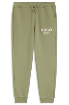 Pantalones de ch&aacute;ndal de algod&oacute;n, Desbordamiento de color beige