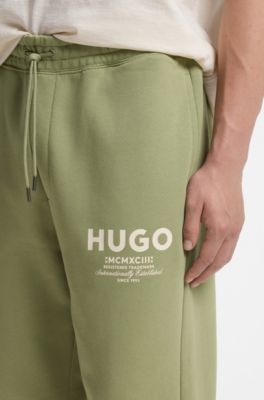 Pantalones de ch&aacute;ndal de algod&oacute;n, Desbordamiento de color beige
