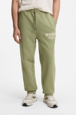 Logo-print tracksuit bottoms in cotton terry, Beige