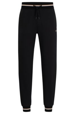 BOSS - Cotton-terry tracksuit bottoms with logo in signature colors