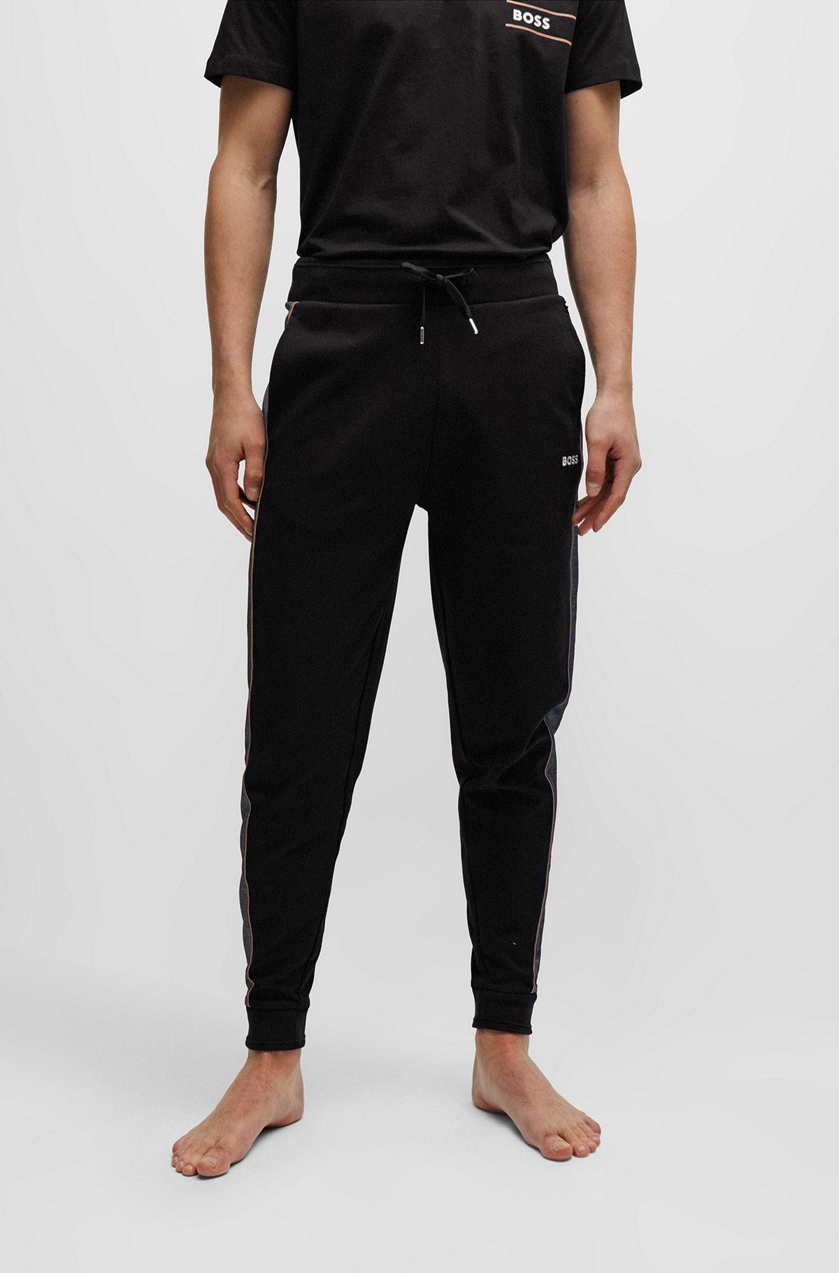  Tracksuit bottoms with embroidered logo, Black