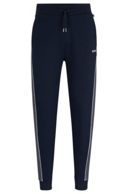 Shop Hugo Boss Tracksuit Bottoms With Embroidered Logo In Dark Blue