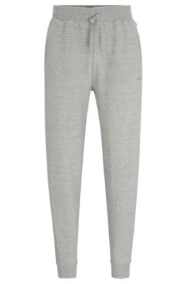 BOSS - Tracksuit bottoms with embroidered logo