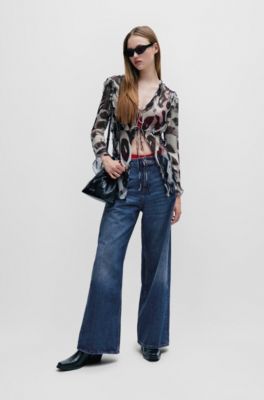 HUGO - Baggy-fit jeans in blue vintage-wash denim - Blue 