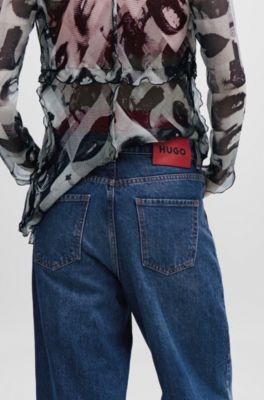HUGO - Baggy-fit jeans in blue vintage-wash denim - Blue 