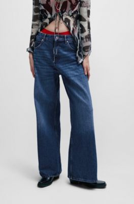 HUGO - Baggy-fit jeans in blue vintage-wash denim - Blue 