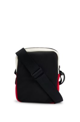 Color-blocked reporter bag with new-season patches, Black