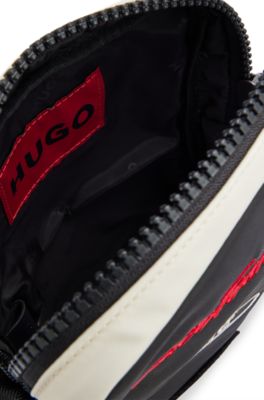 Color-blocked reporter bag with new-season patches, Black