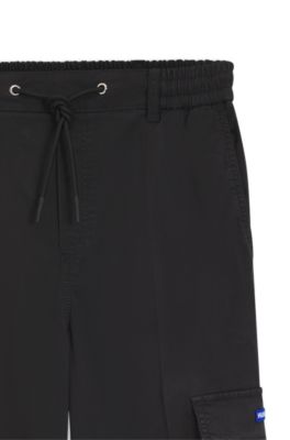Pantalones estilo cargo relaxed fit en algod&oacute;n el&aacute;stico, Negro