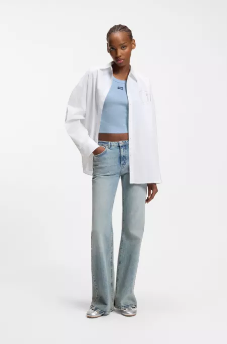 Cropped stretch-cotton tank top with blue logo label